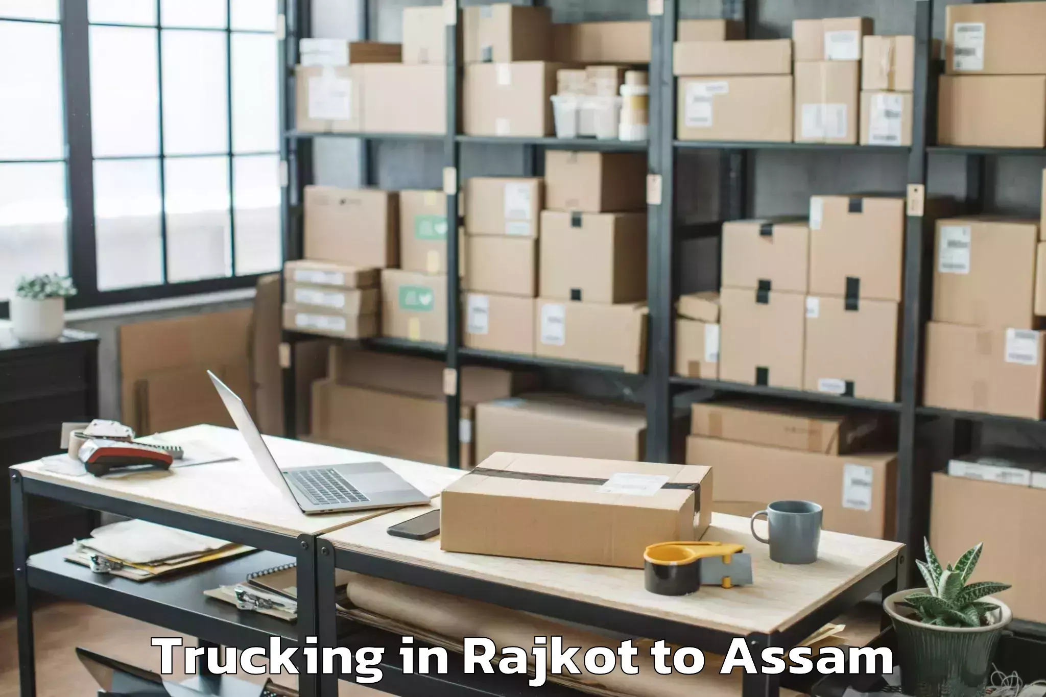 Reliable Rajkot to Marigaon Trucking